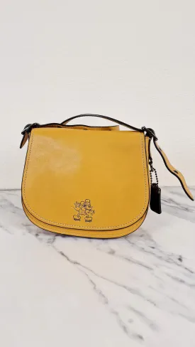 Disney X Coach 1941 Saddle Bag 23 with Mickey Mouse on Roller Skates in Flax Yellow Smooth Leather Crossbody Bag LIMITED EDITION - Coach 38421
